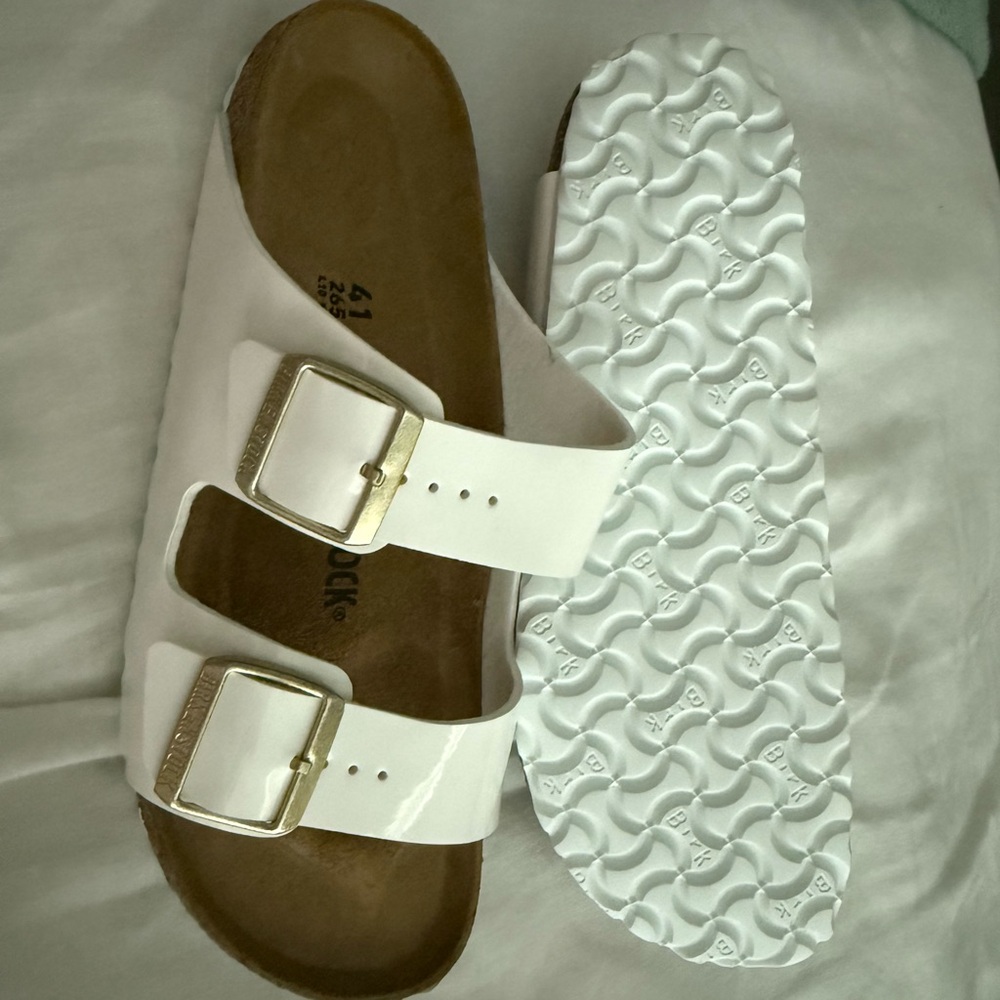 Birkenstock White Sandals with Metallic Buckles